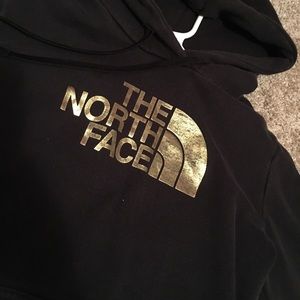 black& gold north face hoodie